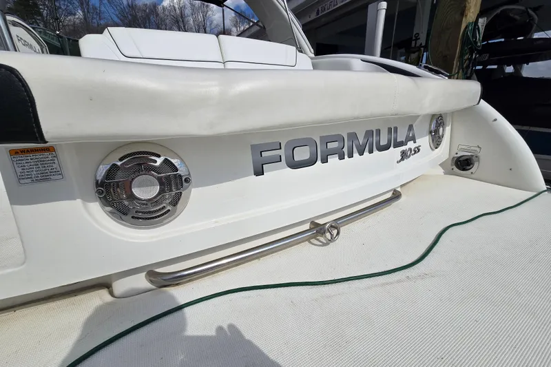 Slide: The Image of 2017 Formula 310 Sun Sport boat rear view with logo and speakers. - 28