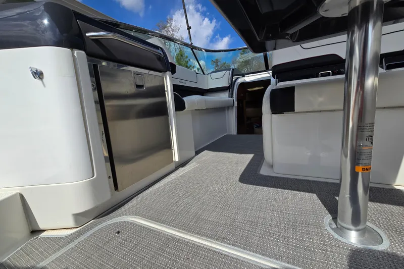 Slide: The Image of 2017 Formula 310 Sun Sport boat interior with stainless steel features and seating. - 31