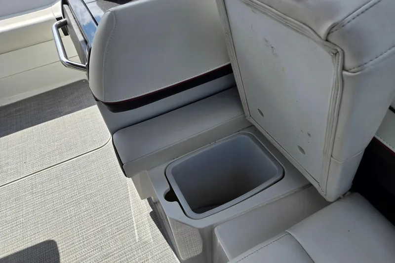 Slide: The Image of 2017 Formula 310 Sun Sport boat interior with seating and storage compartment. - 35