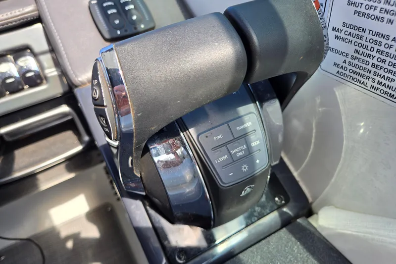 Slide: The Image of Throttle control panel of a 2017 Formula 310 Sun Sport boat. - 40