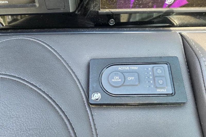 Slide: The Image of Active trim control panel on 2017 Formula 310 Sun Sport boat dashboard. - 43