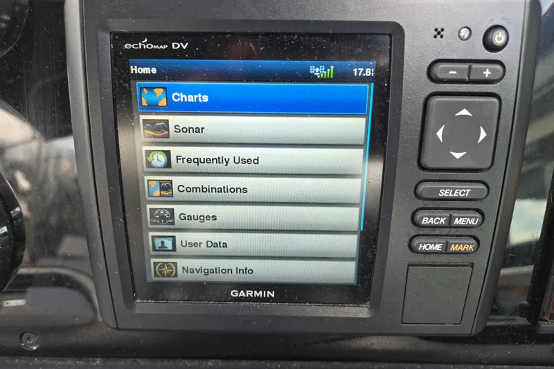 Slide: The Image of Garmin navigation system on 2017 Formula 310 Sun Sport boat, displaying charts and sonar options. - 44