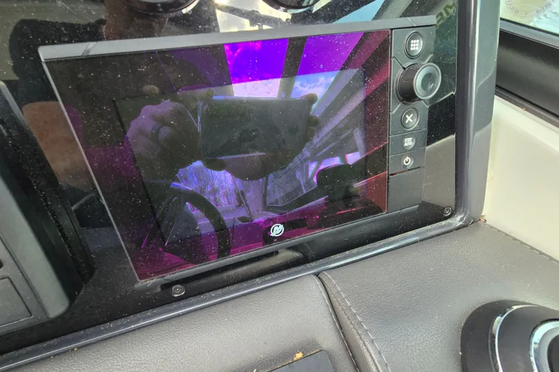 Slide: The Image of Dashboard of a 2017 Formula 310 Sun Sport boat with touchscreen controls. - 45