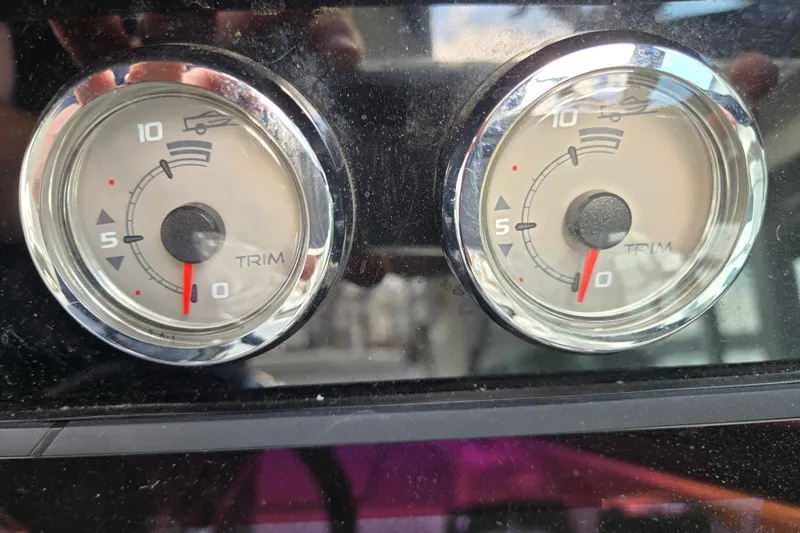 Slide: The Image of Dashboard trim gauges of a 2017 Formula 310 Sun Sport boat. - 48