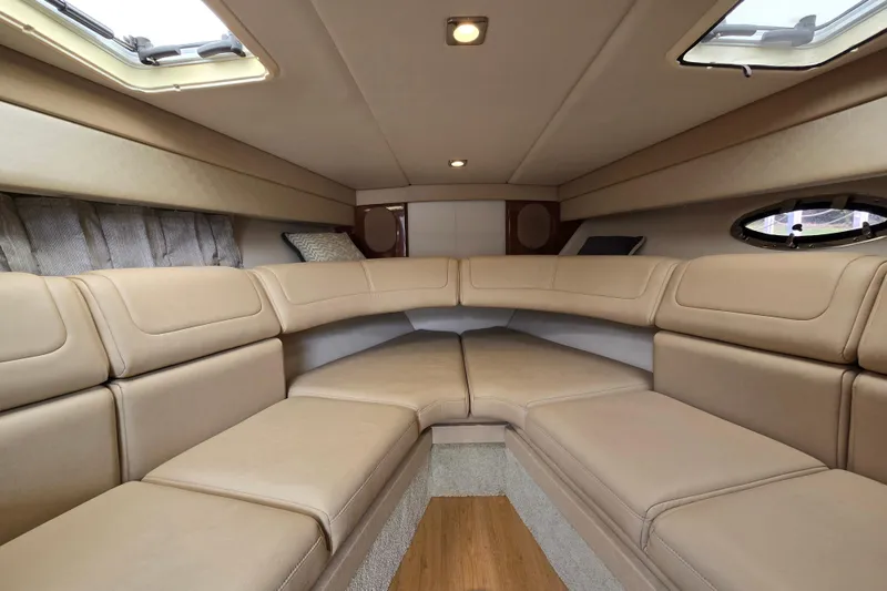 Slide: The Image of Luxurious interior of 2017 Formula 310 Sun Sport boat with beige seating and skylights. - 59