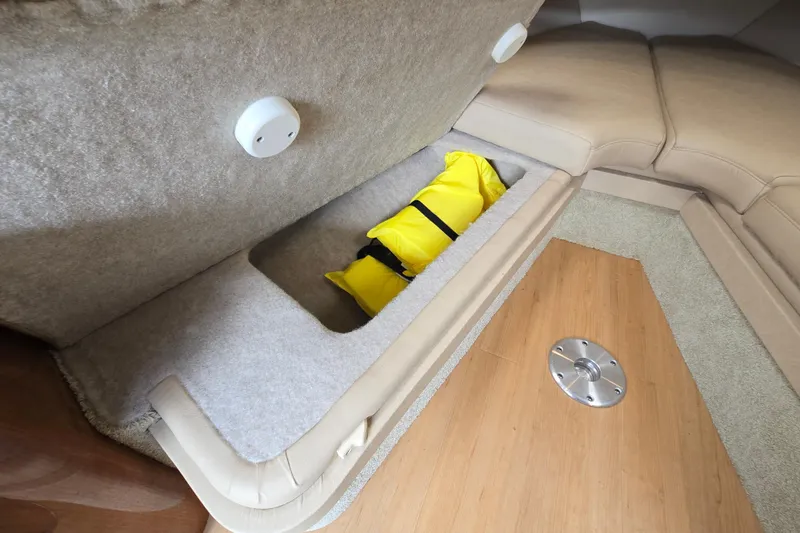 Slide: The Image of 2017 Formula 310 Sun Sport interior storage with yellow life jacket. - 75