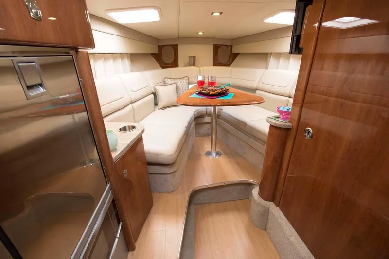 Slide: The Image of Manufacturer Provided Image: 2017 Formula 310 Sun Sport cabin with luxurious seating and dining area. - 93