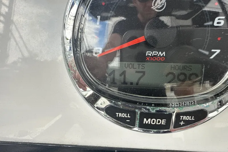 Slide: The Image of Close-up of 2018 Blackfin 212 CC boat tachometer showing 11.7 volts and 299 hours. - 21