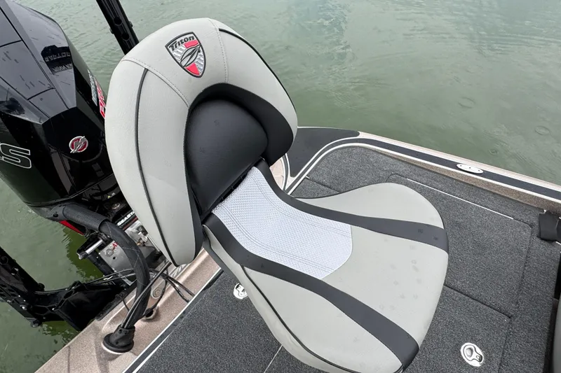 Slide: The Image of 2026 Triton 18 TrX boat seat with sleek design and comfortable cushioning. - 16