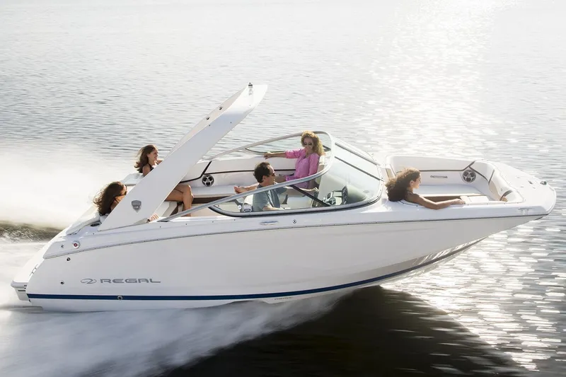 The Image of Manufacturer Provided Image: 2017 Regal 22 FasDeck speedboat cruising on water with passengers. - 0