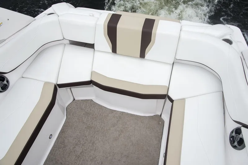 Slide: The Image of Manufacturer Provided Image: 2017 Regal 22 FasDeck boat interior seating with beige and brown accents. - 5