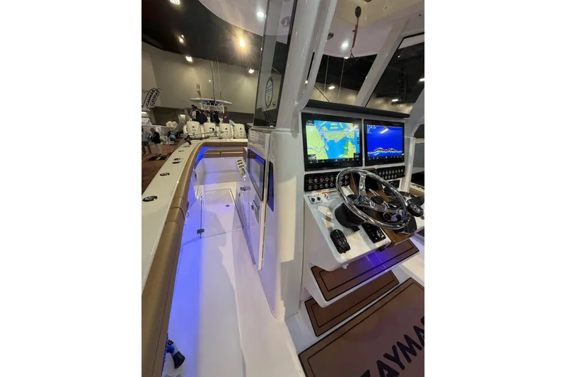 Slide: The Image of 2026 Caymas 29 CT boat interior with advanced navigation system and sleek design. - 6