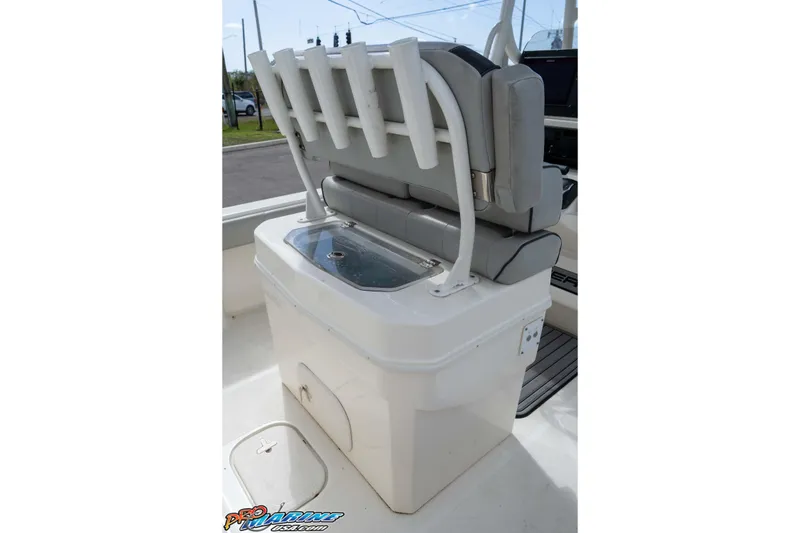 Slide: The Image of 2021 Skeeter SX2550 Family boat with cushioned seating and rod holders. - 23