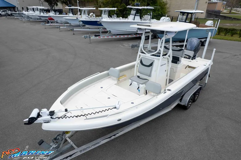 Slide: The Image of 2021 Skeeter SX2550 Family boat on trailer in a dealership lot. - 38