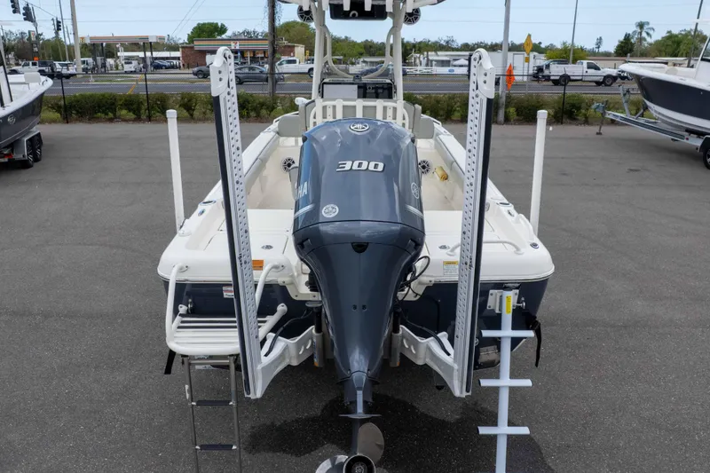 Slide: The Image of 2021 Skeeter SX2550 Family boat with Yamaha 300 engine, rear view in parking lot. - 46