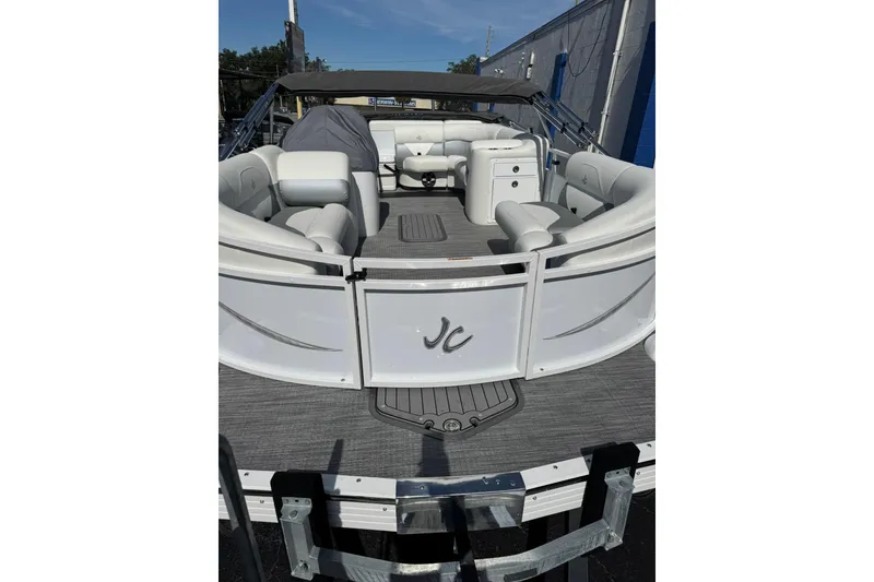 Slide: The Image of 2026 JC Spirit 222 TT Sport pontoon boat with spacious seating and modern design. - 5
