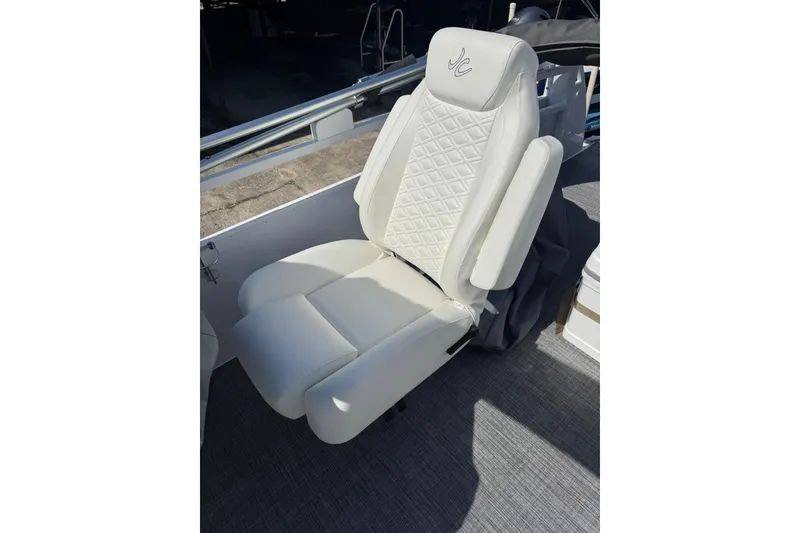 Slide: The Image of Luxurious white seat on 2026 JC Spirit 222 TT Sport boat, featuring diamond stitching. - 9
