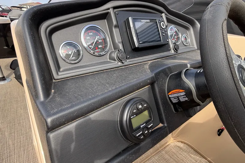 Slide: The Image of 2023 Bentley 243 Navigator dashboard with gauges and navigation system. - 27