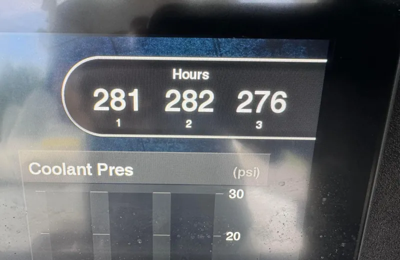 Slide: The Image of Display screen showing engine hours and coolant pressure for 2020 Onslow Bay 33 Tournament. - 54
