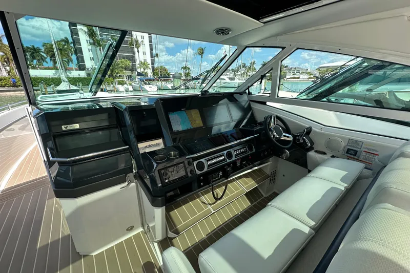 Slide: The Image of 2023 Formula 430 All Sport Crossover helm with modern navigation systems and luxurious seating. - 23