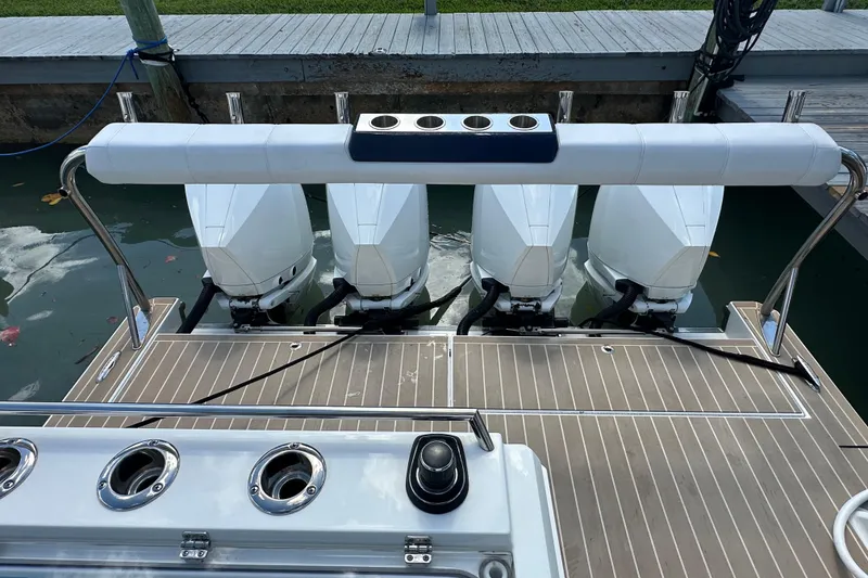 Slide: The Image of 2023 Formula 430 All Sport Crossover boat with four powerful outboard engines. - 31