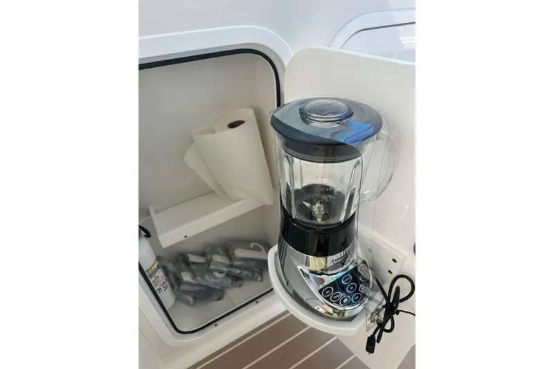 Slide: The Image of Blender and storage area on 2023 Formula 430 All Sport Crossover boat. - 35