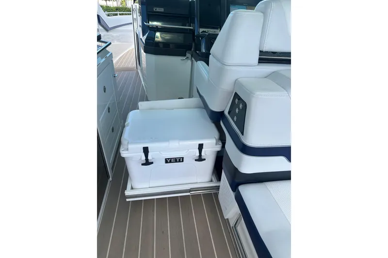 Slide: The Image of 2023 Formula 430 All Sport Crossover interior with Yeti cooler on deck. - 36