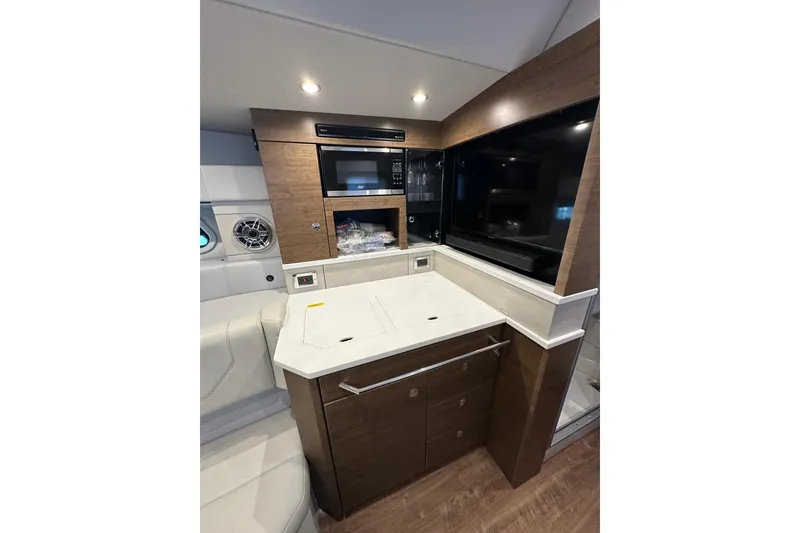 Slide: The Image of Interior of 2023 Formula 430 All Sport Crossover with modern kitchen amenities. - 40