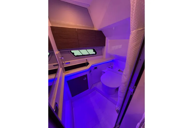 Slide: The Image of 2023 Formula 430 All Sport Crossover bathroom with modern design and ambient lighting. - 42