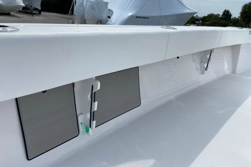 Slide: The Image of 2026 Sportsman Masters 267 Bay Boat interior detail with storage compartments. - 22