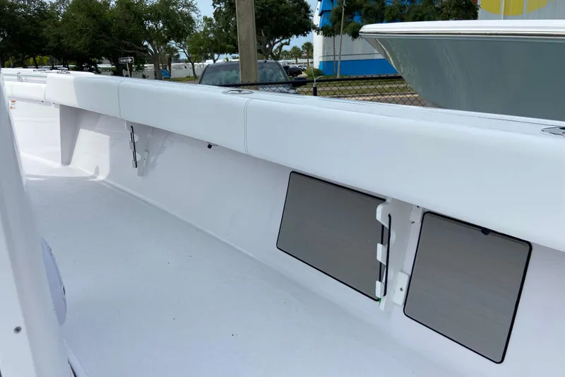 Slide: The Image of 2026 Sportsman Masters 267 Bay Boat interior with storage compartments. - 23