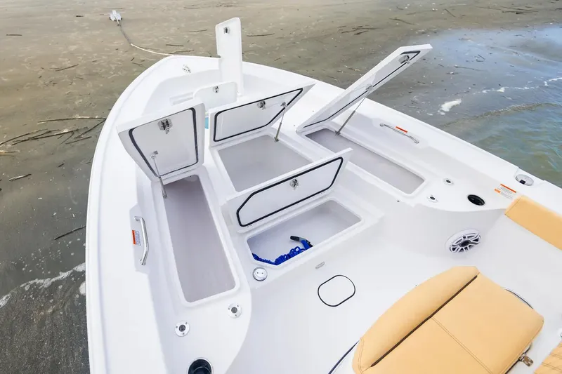 Slide: The Image of Manufacturer Provided Image: 2025 Sportsman Masters 267 Bay Boat with open storage compartments on deck. - 4