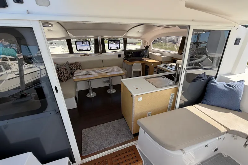 Slide: The Image of Interior of 2014 Outremer 45 catamaran with modern kitchen and seating area. - 29