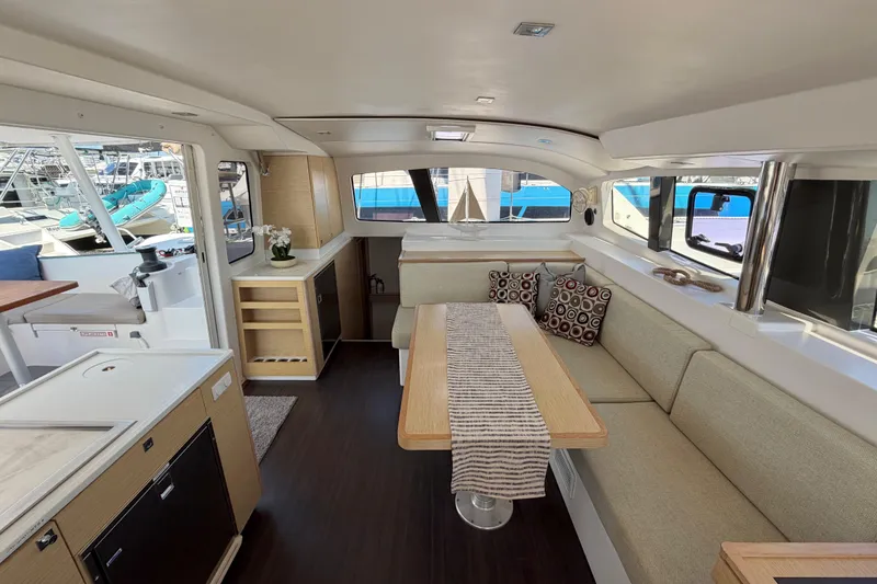 Slide: The Image of Luxurious interior of 2014 Outremer 45 catamaran with modern seating and dining area. - 33