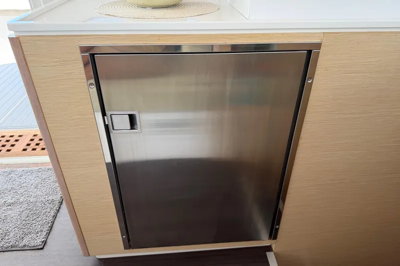 Slide: The Image of Stainless steel cabinet door on 2014 Outremer 45 yacht interior. - 38