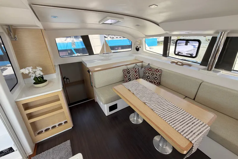 Slide: The Image of Interior of 2014 Outremer 45 catamaran with modern dining area and stylish decor. - 39
