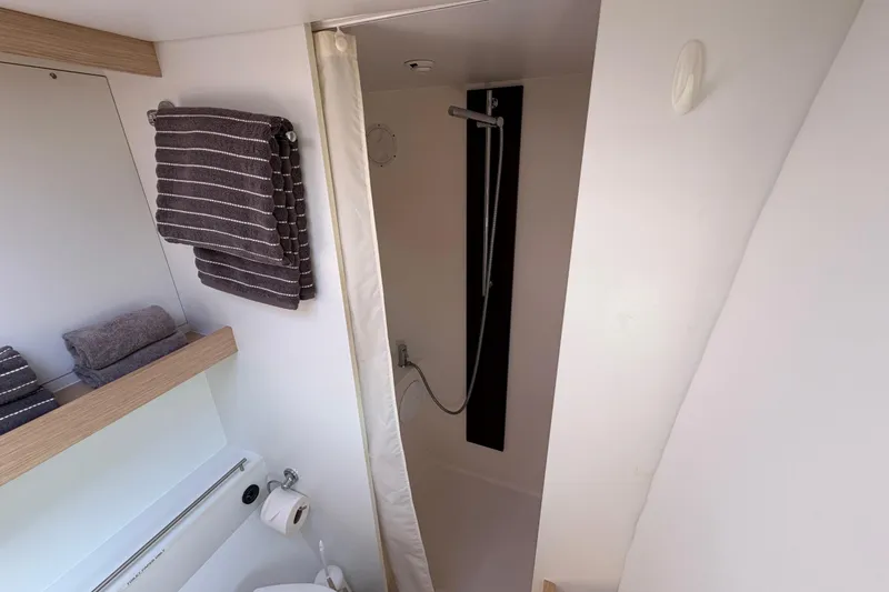 Slide: The Image of Bathroom interior of 2014 Outremer 45 yacht with shower and towels. - 50