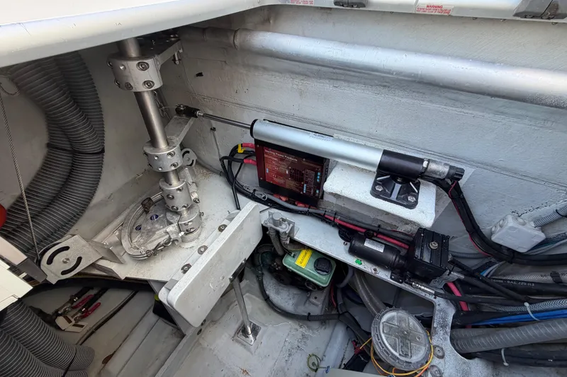 Slide: The Image of Teak deck detail on 2014 Outremer 45 catamaran, featuring lattice design and gray flooring. - 73