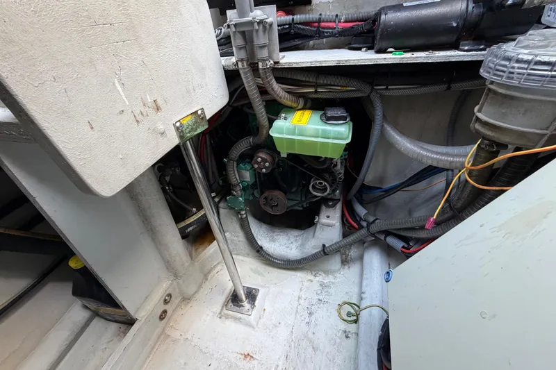 Slide: The Image of Battery charger and cables in an Outremer 45, 2014 model, boat engine compartment. - 75