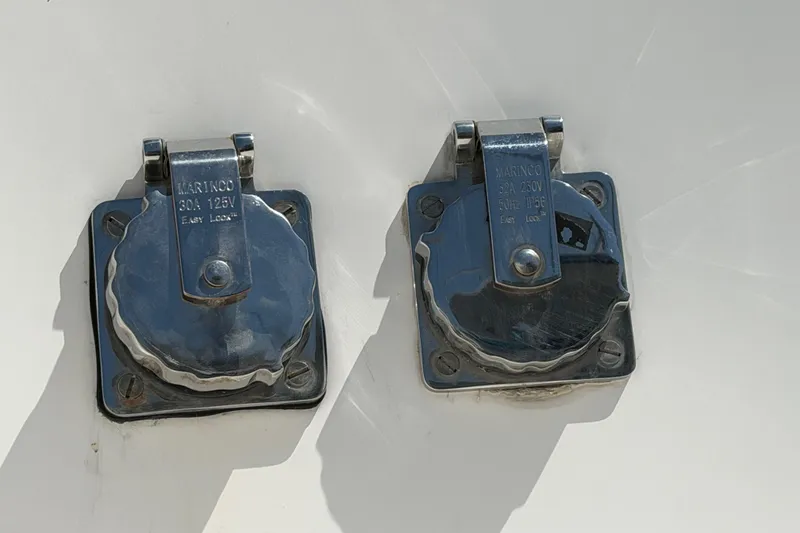 Slide: The Image of Control panel of a 2014 Outremer 45 water maker system with instructions and gauges. - 78