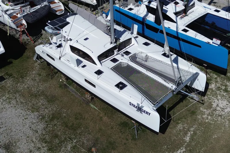 Slide: The Image of Outremer 45 catamaran hull and propeller, 2014 model, on dry dock. - 84