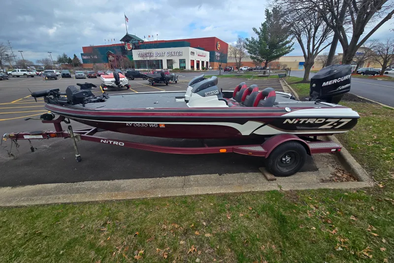 Slide: The Image of 2011 Nitro Z-7 boat with Mercury engine parked at Tracker Boat Center. - 2