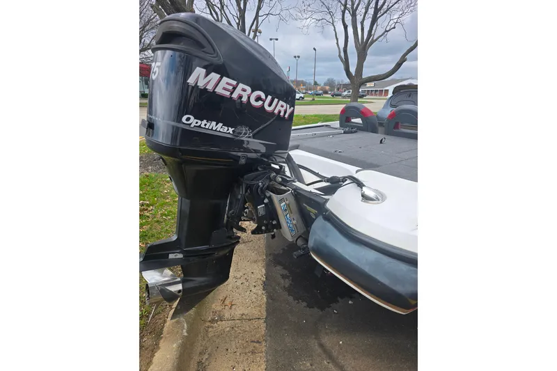 Slide: The Image of 2011 Nitro Z-7 boat with Mercury OptiMax engine in parking lot. - 3