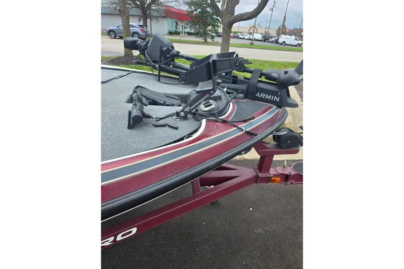 Slide: The Image of 2011 Nitro Z-7 boat with Garmin equipment on trailer, parked outdoors. - 6