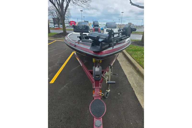 Slide: The Image of 2011 Nitro Z-7 boat with Garmin equipment, parked in a lot. - 8