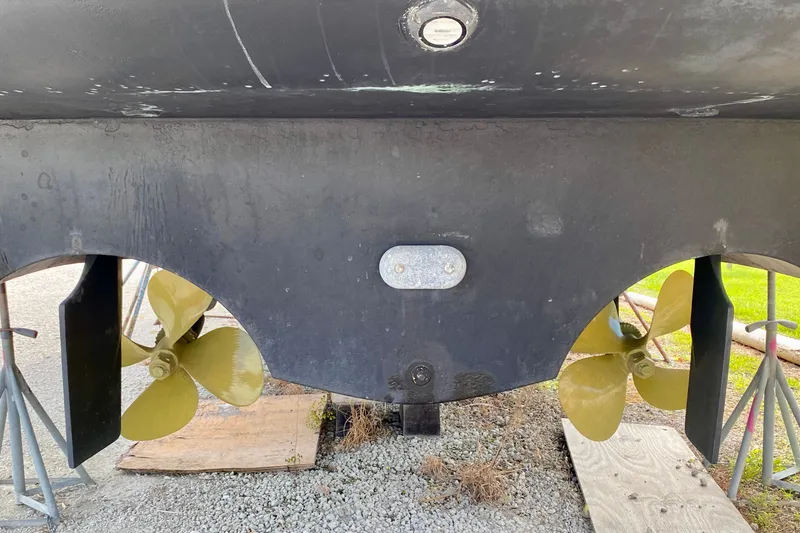 Slide: The Image of Underwater view of 2000 Carver 450 Voyager Pilothouse propellers and rudders. - 19