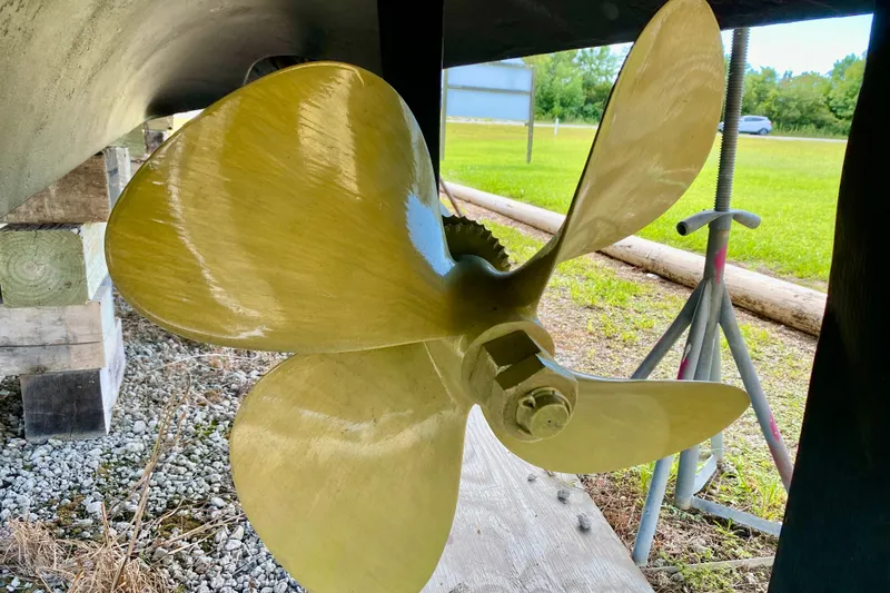 Slide: The Image of Close-up of a 2000 Carver 450 Voyager Pilothouse propeller on dry dock. - 20