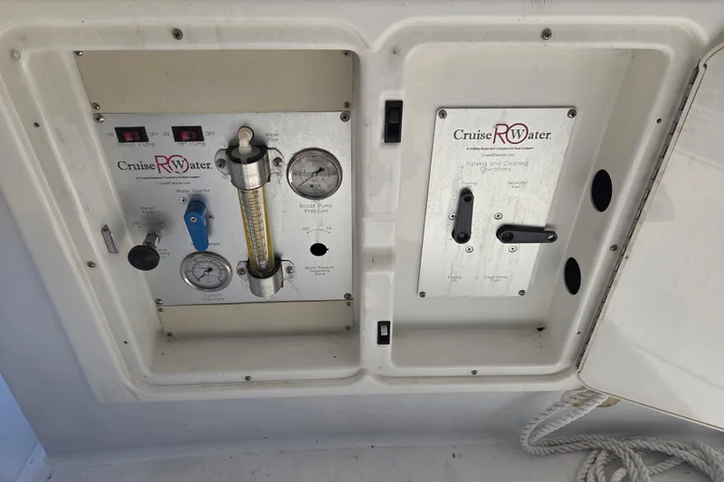 Slide: The Image of Control panel of a 2000 Carver 450 Voyager Pilothouse with Cruise RO Water system. - 18