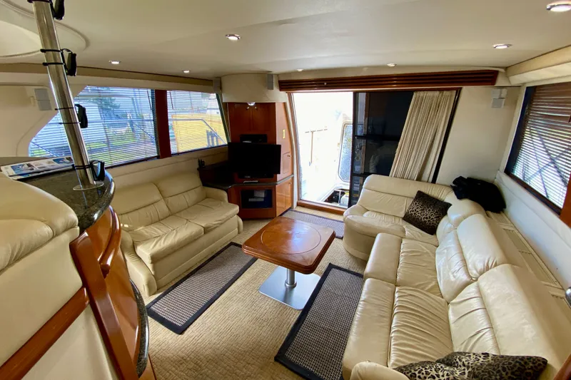 Slide: The Image of Luxurious interior of 2000 Carver 450 Voyager Pilothouse with leather seating and modern amenities. - 62