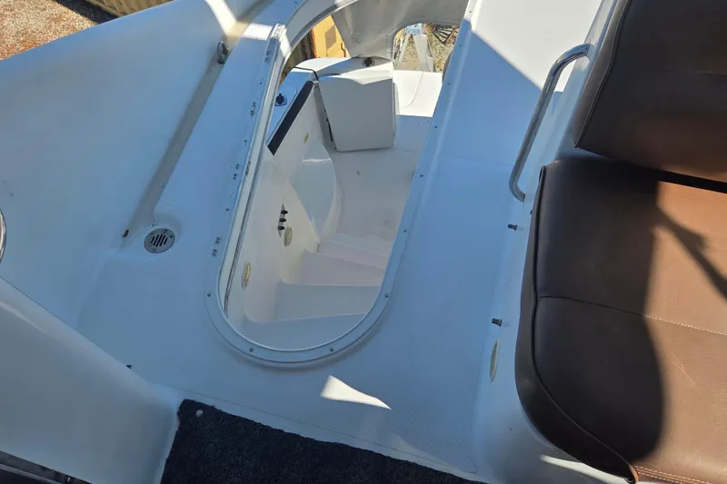 Slide: The Image of 2000 Carver 450 Voyager Pilothouse interior stairs and seating area. - 34